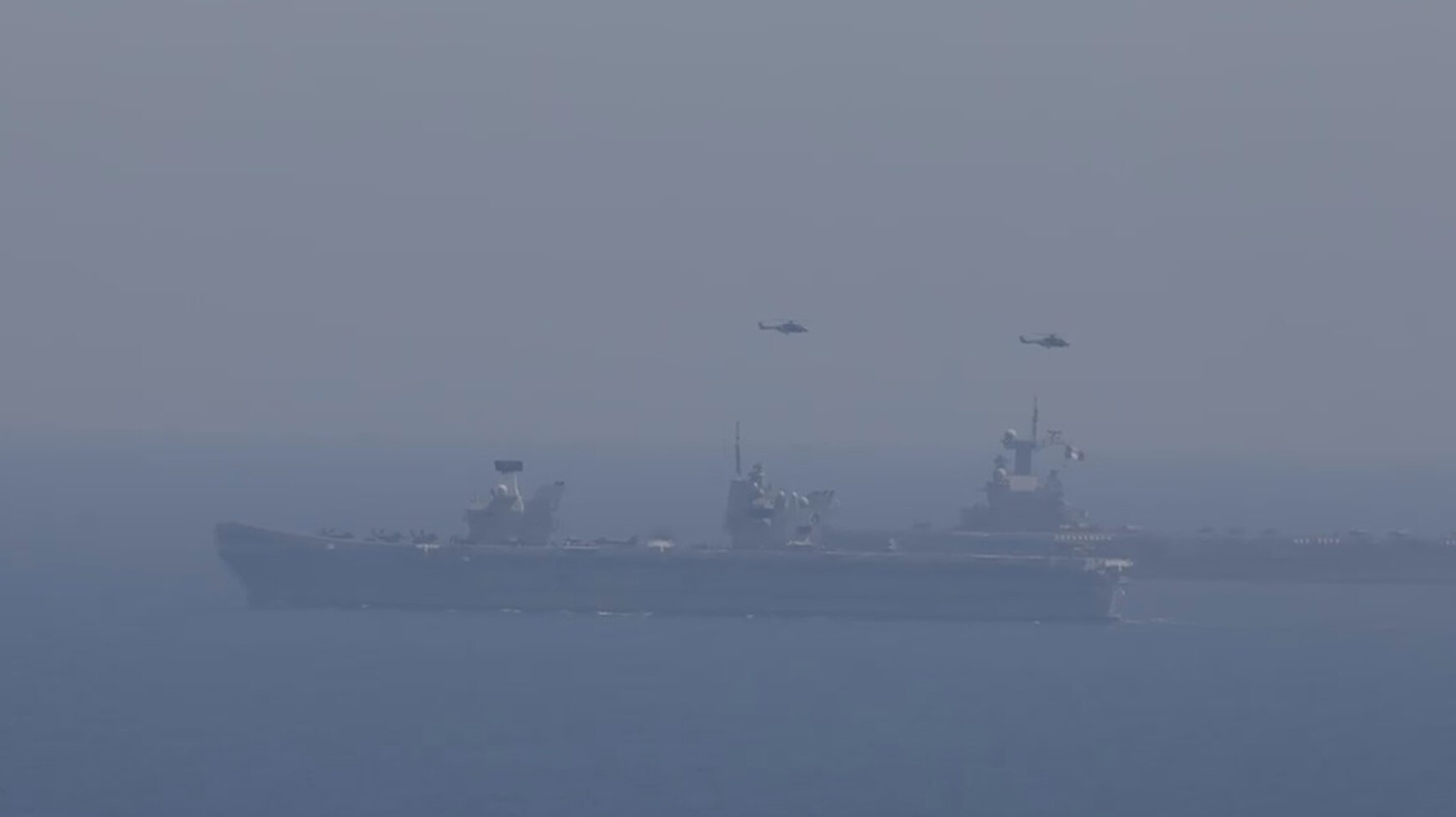 HMS Queen Elizabeth and FS Charles side-by-side for the first time in the Mediterranean Sea on the 4th of June 2021. (Royal Navy/Newsflash)